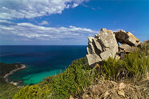 Sardinia rock and beach below