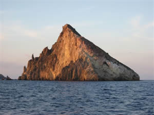 The volcanic origin of the islands give rise to many stunning islands and rock formations such as this
